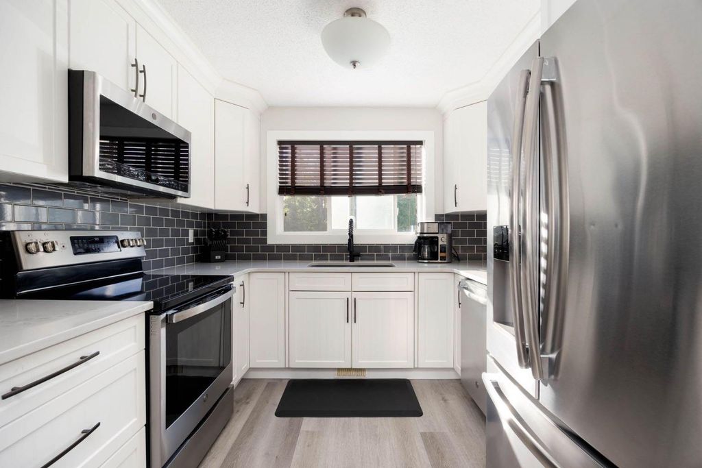 Photo of 1041 Timberline Drive, Fort McMurray, AB T9K 1A8 (MLS # A2320194)