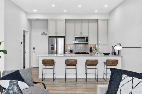 Photo of 255 Les Jardins Park SE #410, Calgary, AB T2C 5W9 (MLS # A2316225)