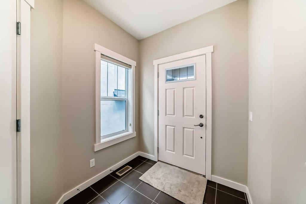Photo of 210 Stonemere Green, Chestermere, AB T1X 0S2 (MLS # A2308839)