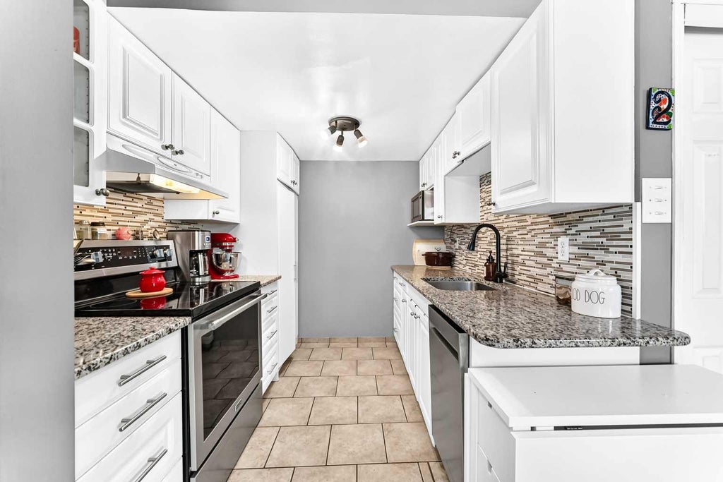 Photo of 1055 72 Avenue NW #2, Calgary, AB T2K 5S4 (MLS # A2354597)