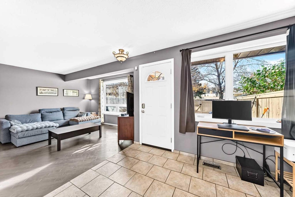 Photo of 1055 72 Avenue NW #2, Calgary, AB T2K 5S4 (MLS # A2354597)