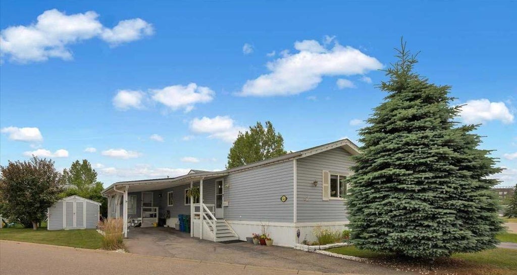 Photo of 99 Arbour Lake Drive Rd #62, Calgary, AB T3G 4E4 (MLS # A2328913)