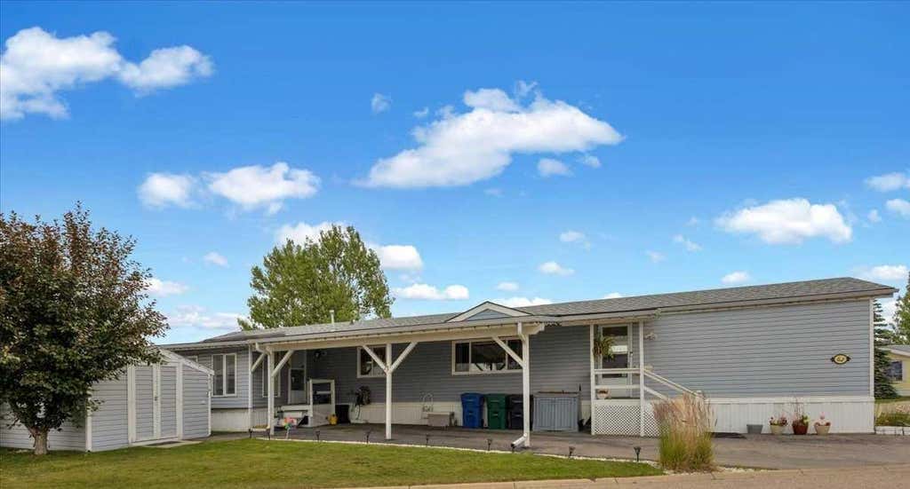 Photo of 99 Arbour Lake Drive Rd #62, Calgary, AB T3G 4E4 (MLS # A2328913)