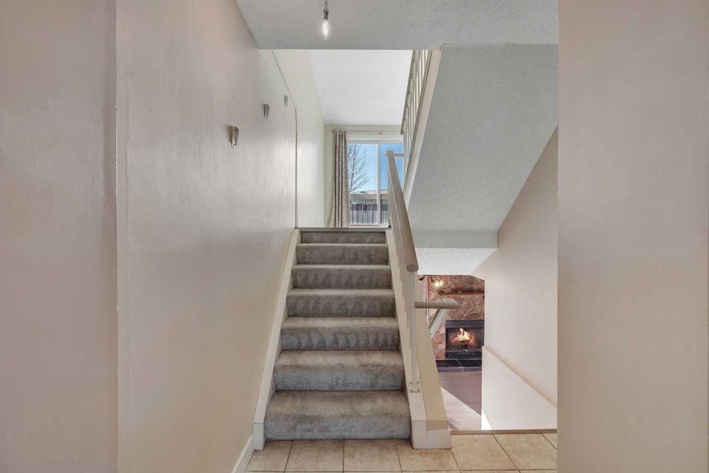 Photo of 1190 Ranchview Road NW #92, Calgary, AB T3G 1Y1 (MLS # A2293282)