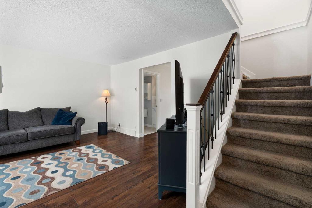 Photo of 123 Queensland Drive SE #144, Calgary, AB T2J 5J4 (MLS # A2305713)