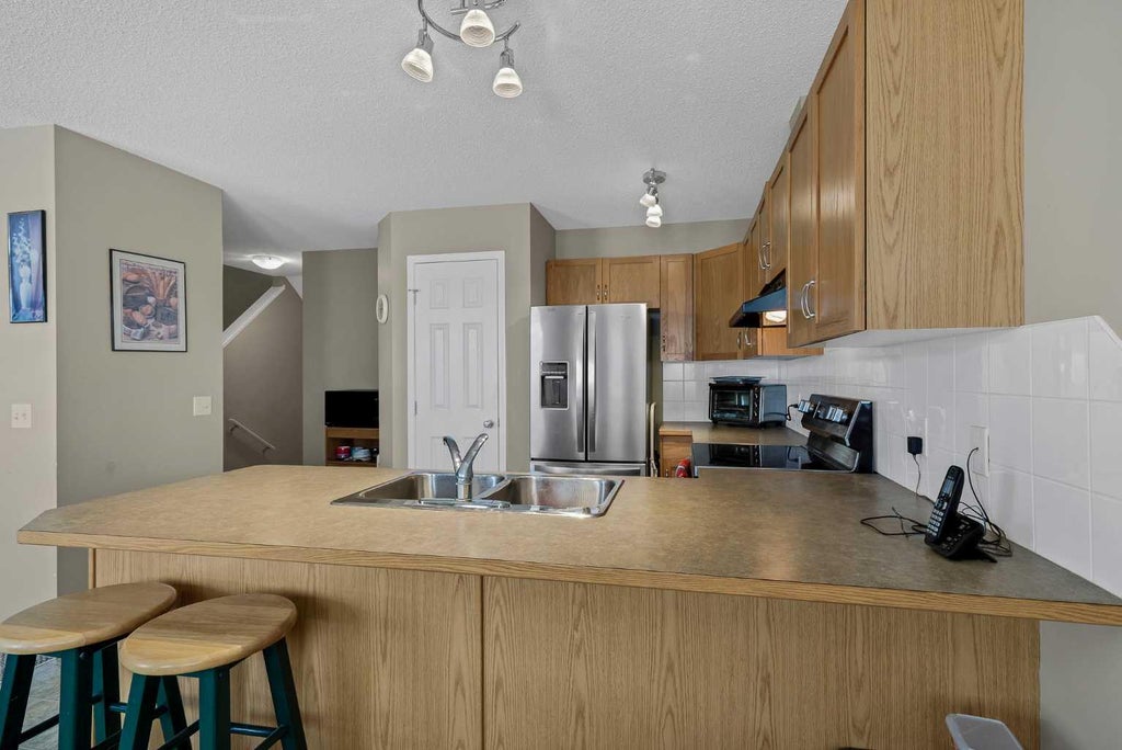 Photo of 800 Yankee Valley Boulevard SE #1302, Airdrie, AB T4A 2L3 (MLS # A2340456)