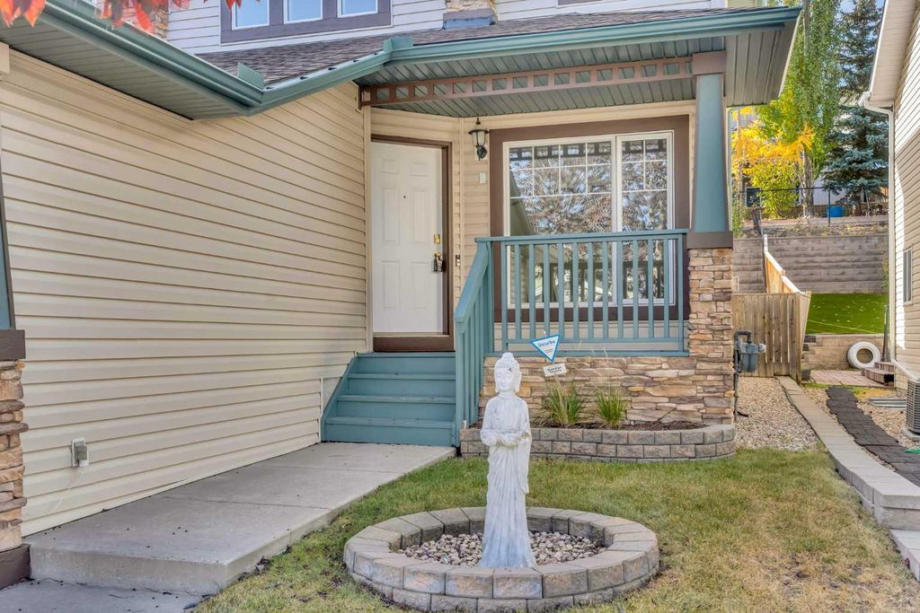 Photo of 338 Panamount Drive NW, Calgary, AB T3K 5M1 (MLS # A2302756)