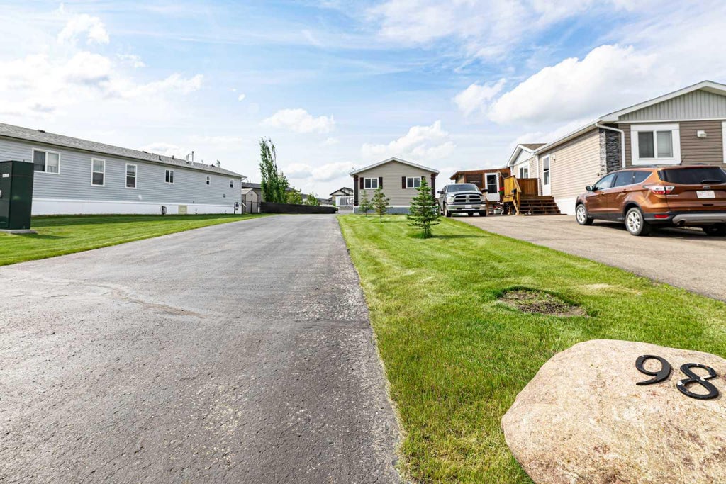 Photo of 15 Mackenzie Ranch Way #98, Lacombe, AB T4L 0B4 (MLS # A2327113)