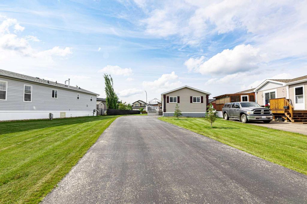 Photo of 15 Mackenzie Ranch Way #98, Lacombe, AB T4L 0B4 (MLS # A2327113)