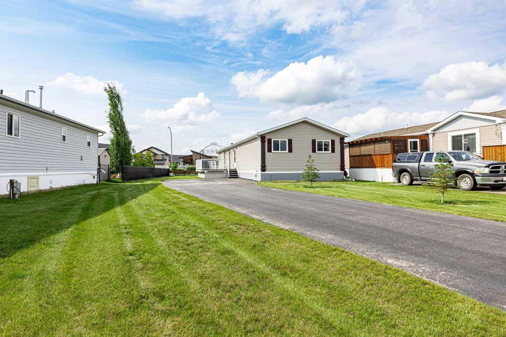 Photo of 15 Mackenzie Ranch Way #98, Lacombe, AB T4L 0B4 (MLS # A2327113)