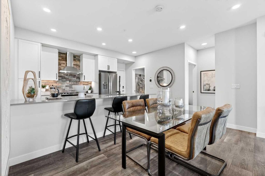 Photo of 255 Les Jardins Park SE #216, Calgary, AB T2C 5W9 (MLS # A2255356)