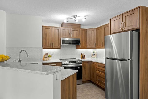 Photo of 16969 24 Street SW #5210, Calgary, AB T2Y 0J8 (MLS # A2334283)