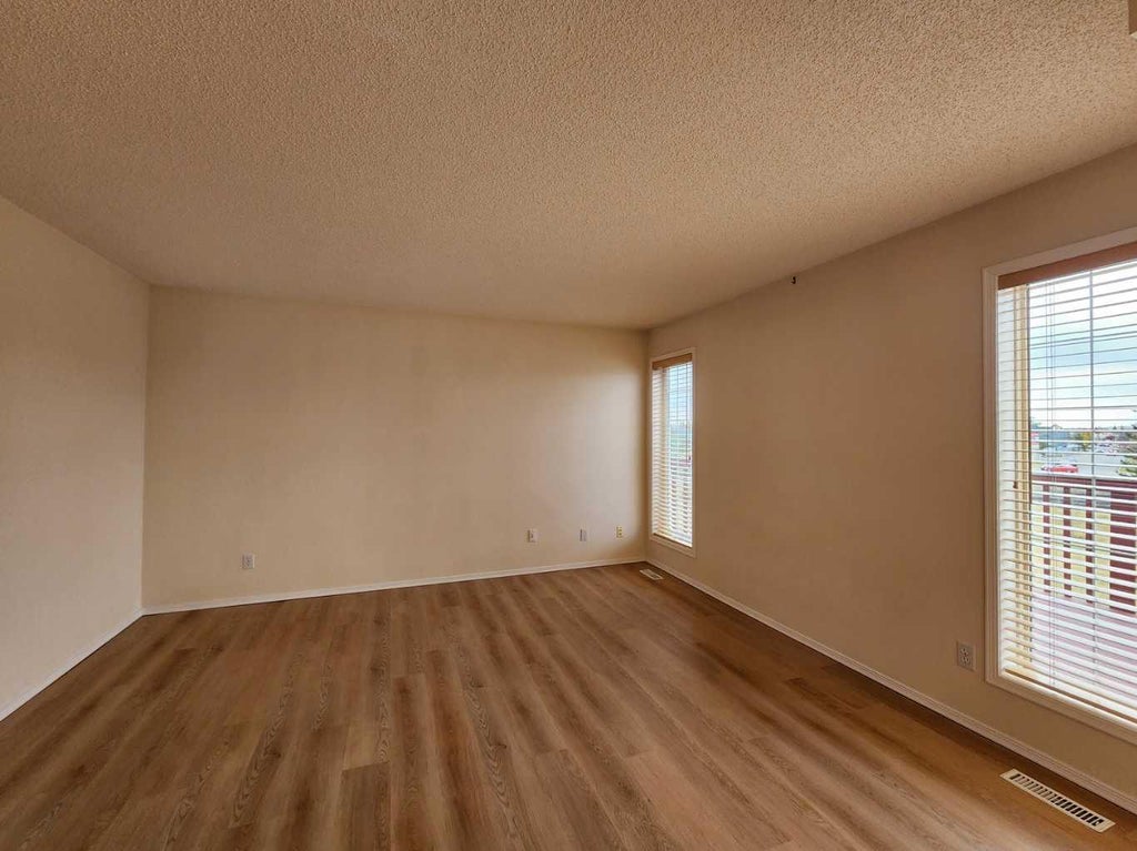 Photo of 102 Somervale Green SW, Calgary, AB T2Y 3K1 (MLS # A2354951)