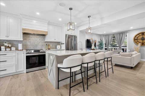 Photo of 75 Shawglen Way SW, Calgary, AB T2Y 1Y9 (MLS # A2333503)