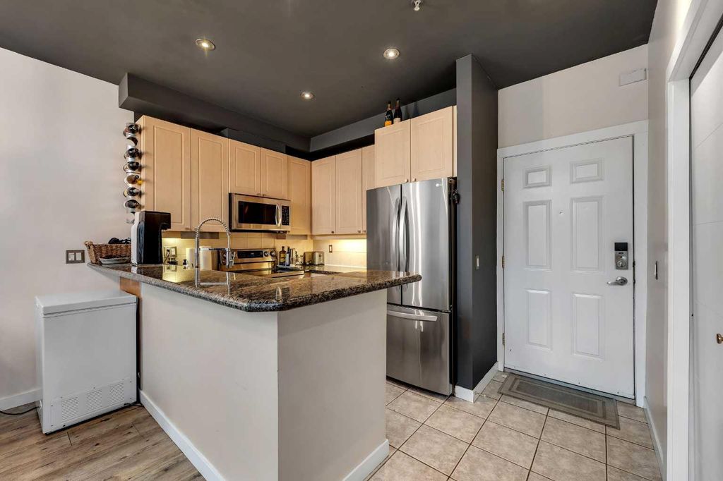 Photo of 527 15 Avenue SW #416, Calgary, AB T2R 1R5 (MLS # A2312574)