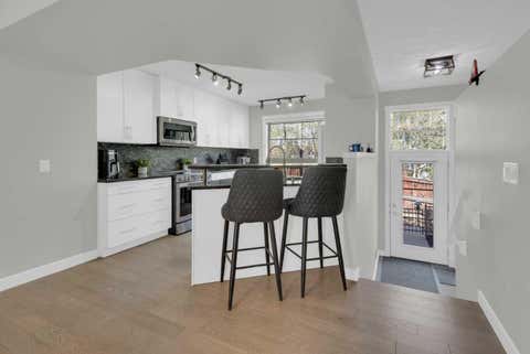 Photo of 24 Aspen Hills Common SW, Calgary, AB T3H 0R7 (MLS # A2334357)