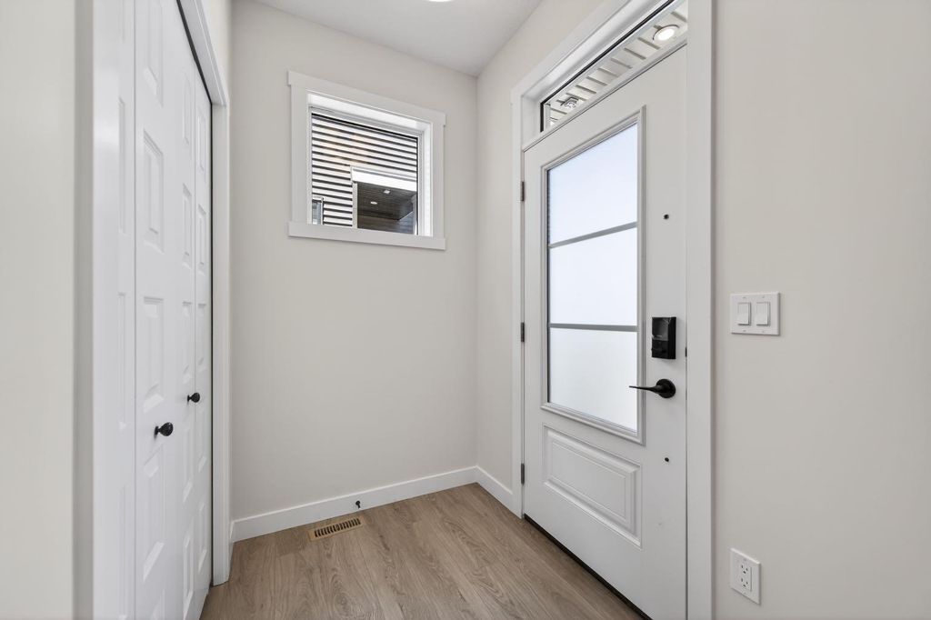 Photo of 1059 Bayview Crescent, Airdrie, AB T4B 5N8 (MLS # A2314616)