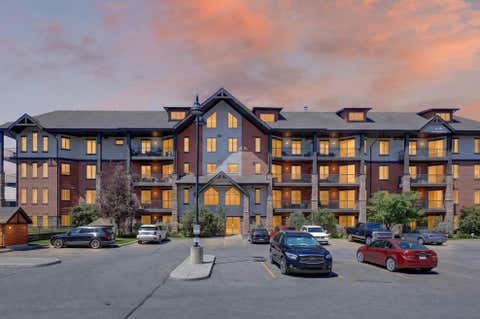 Photo of 15 Sunset Square #2305, Cochrane, AB T4C 0E7 (MLS # A2329079)