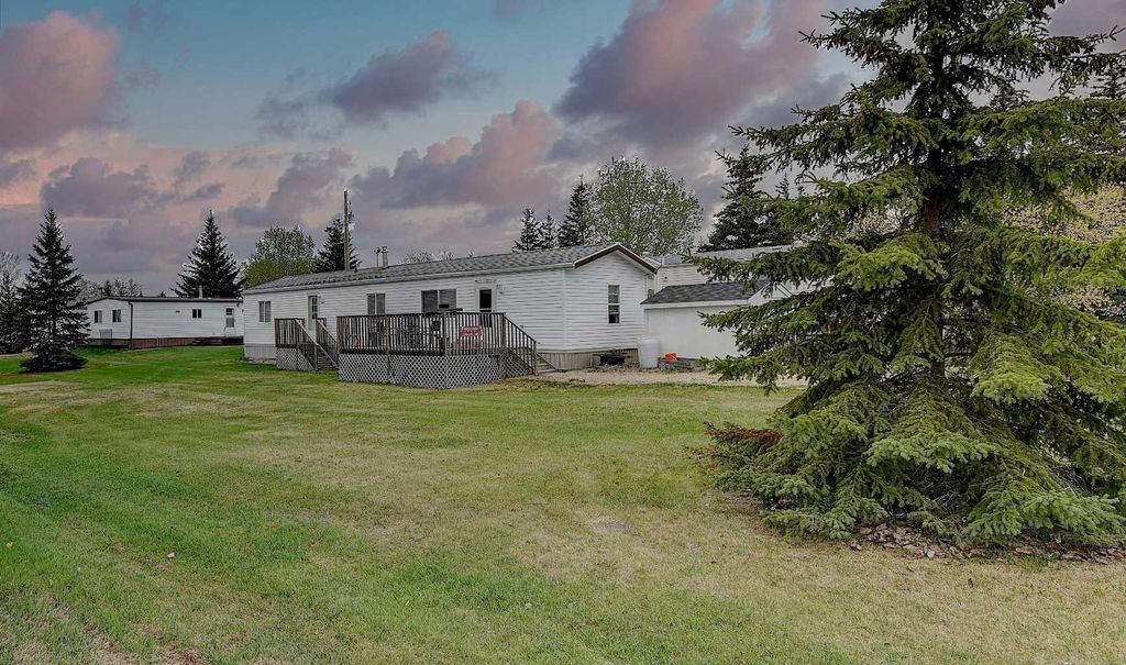 Photo of 10301 99 Avenue, Bezanson, AB T0H 0G0 (MLS # A2311900)
