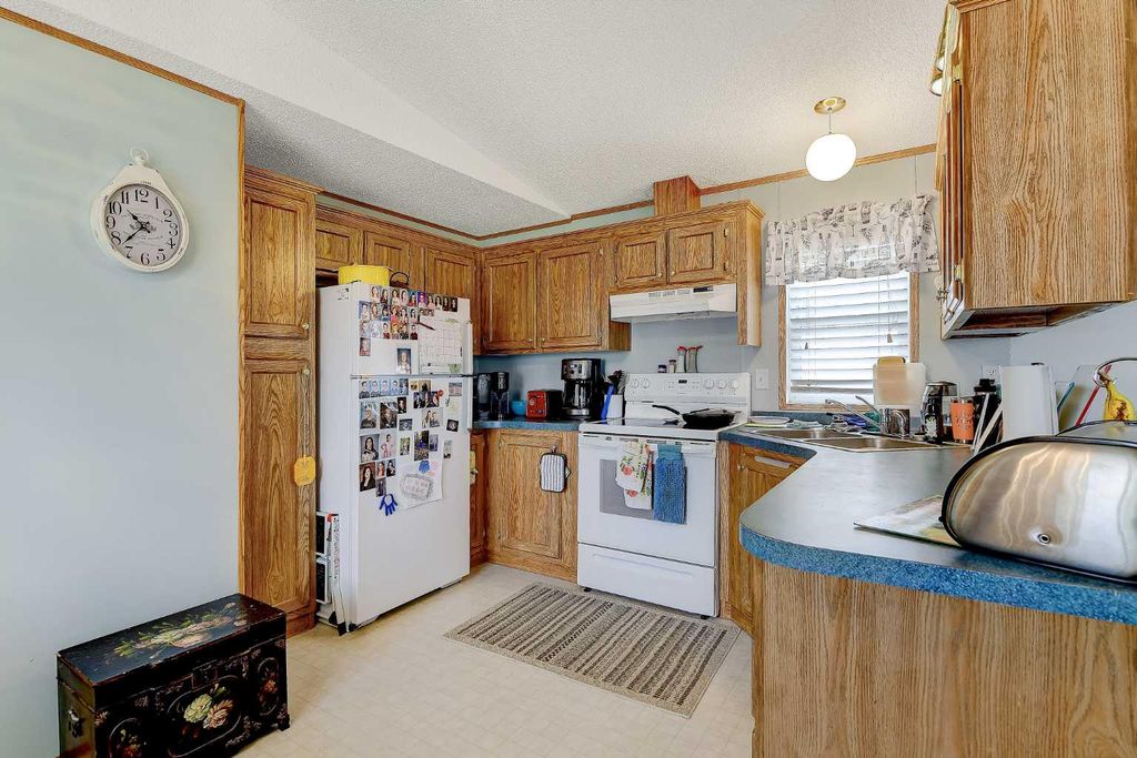 Photo of 10301 99 Avenue, Bezanson, AB T0H 0G0 (MLS # A2311900)