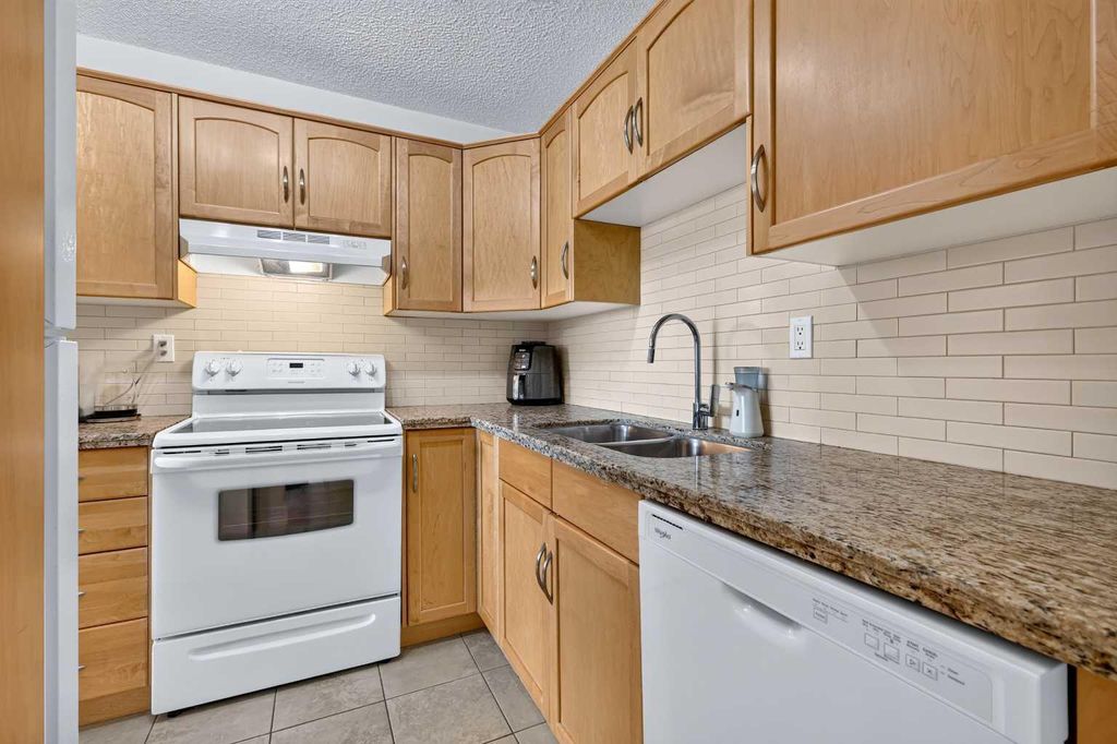 Photo of 1123 13 Avenue SW #502, Calgary, AB T2R 0L7 (MLS # A2322168)