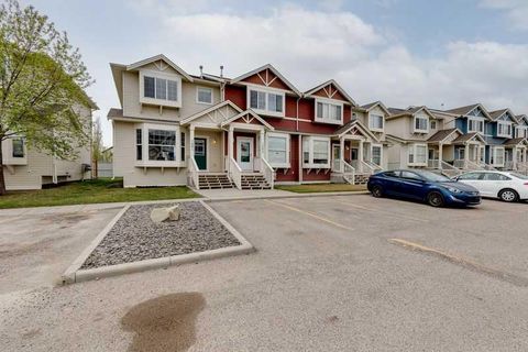 Photo of 703 Luxstone Square SE #1001, Airdrie, AB T4B 0A4 (MLS # A2311177)