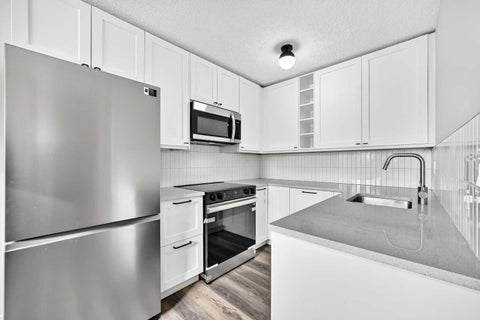 Photo of 195 Manora Place NE, Calgary, AB T2X 7A5 (MLS # A2354164)