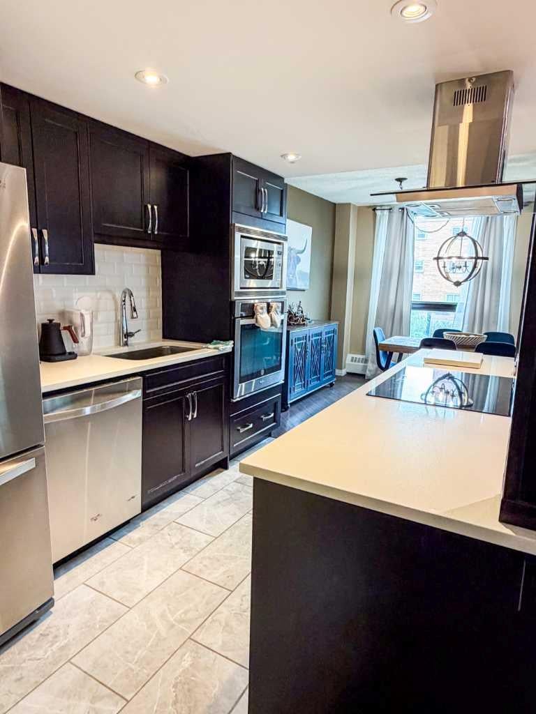 Photo of 1304 15 Avenue SW #220, Calgary, AB T3C 0X7 (MLS # A2339129)