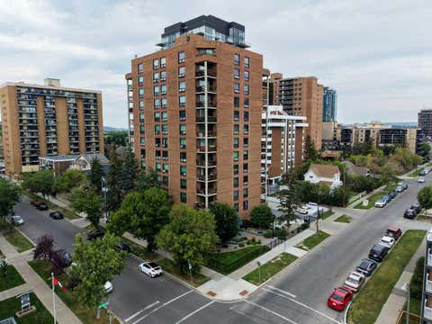Photo of 1304 15 Avenue SW #220, Calgary, AB T3C 0X7 (MLS # A2339129)