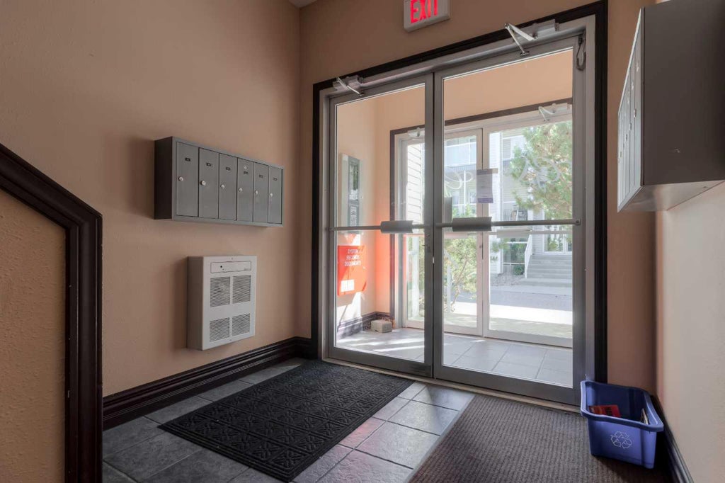 Photo of 23 Chilcotin Lane W #213, Lethbridge, AB T1K 7G8 (MLS # A2342468)