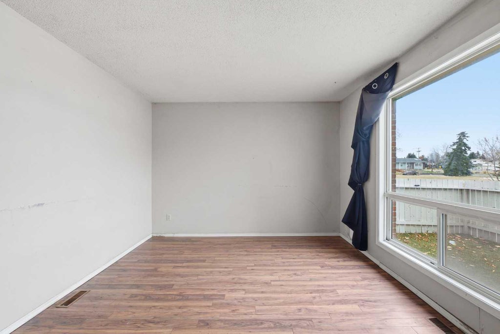 Photo of 64 Whitnel Court NE #28, Calgary, AB T1Y 5E3 (MLS # A2355317)