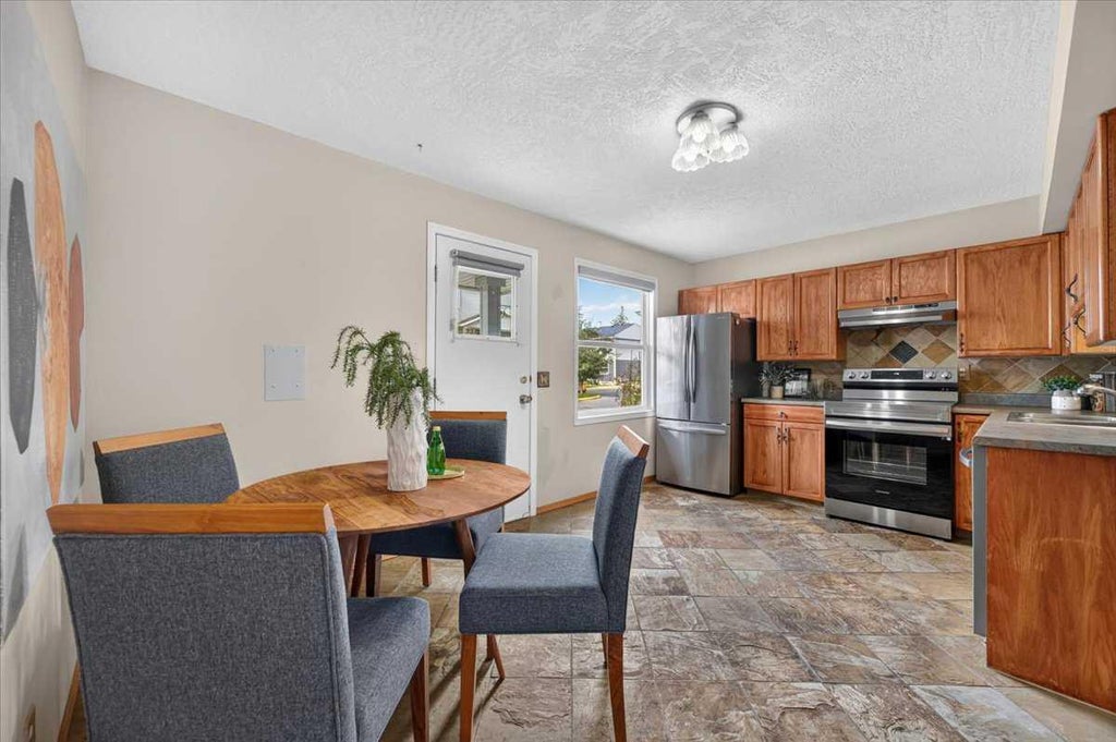Photo of 572 Regal Park NE, Calgary, AB T2E 0S6 (MLS # A2347999)