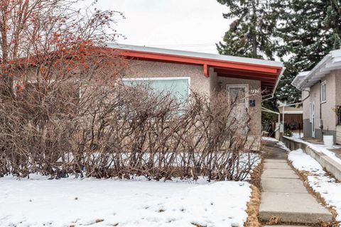 Photo of 717 67 Avenue SW, Calgary, AB T2V 0M4 (MLS # A2299446)