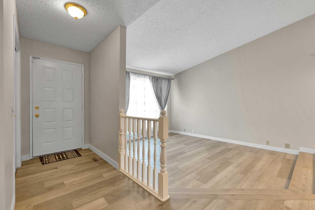 Photo of 1111 Berkley Drive NW, Calgary, AB T3K 1S6 (MLS # A2294270)