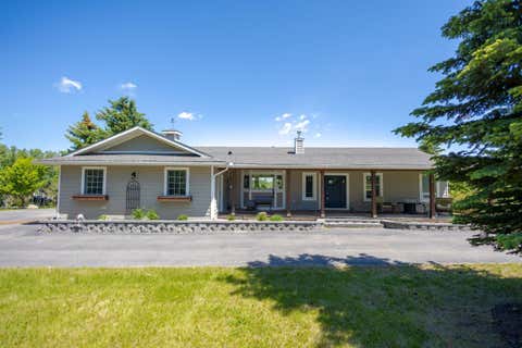 Photo of 260048 Bearspaw Road, Rural Rocky View County, AB T3R 1H4 (MLS # A2300152)