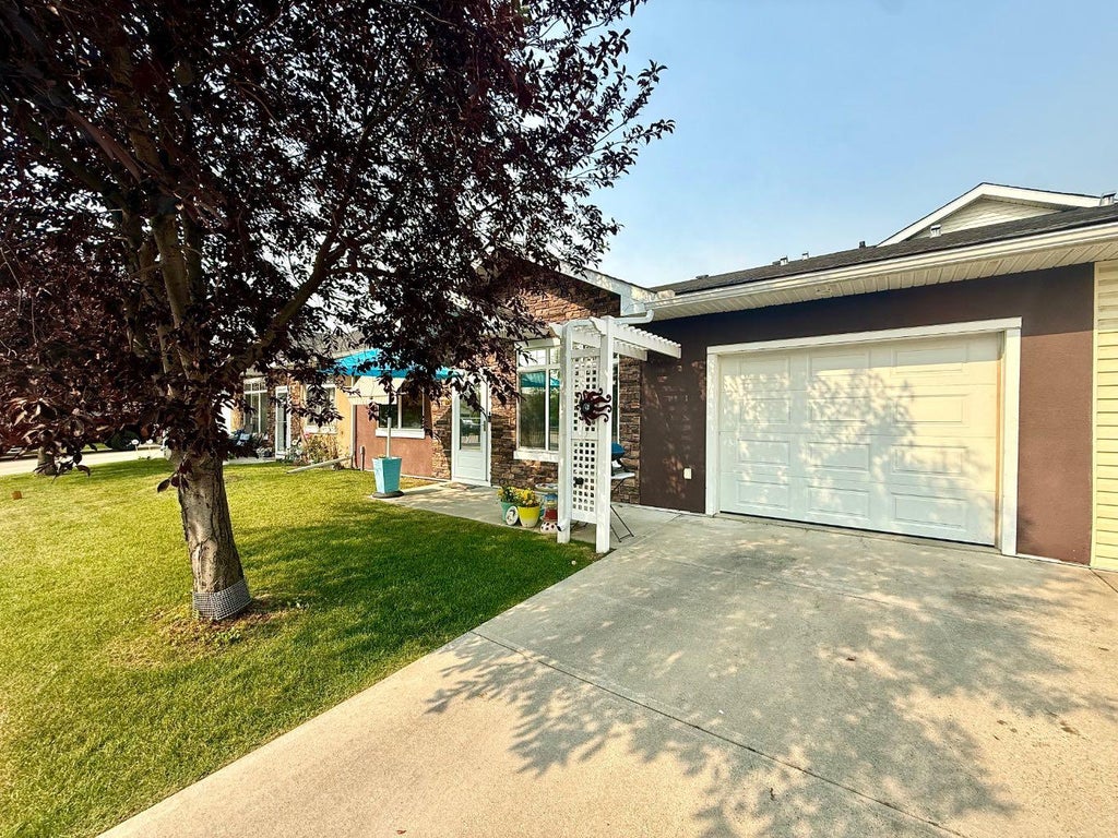 Photo of 104 Sunvale Crescent NE, High River, AB T1V 0E8 (MLS # A2353214)