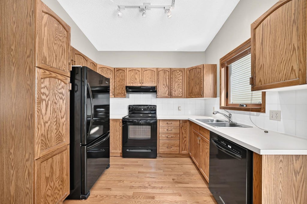 Photo of 192 Riverbend Drive SE, Calgary, AB T2C 3X8 (MLS # A2329034)