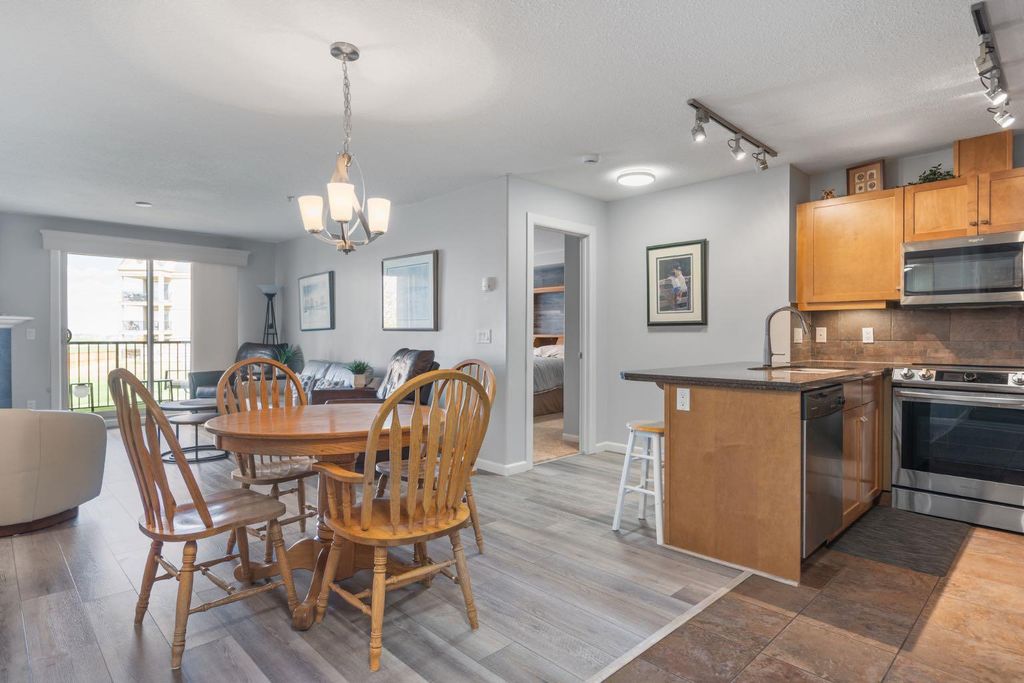 Photo of 30 Cranfield Link SE #206, Calgary, AB T3M 0C4 (MLS # A2310498)