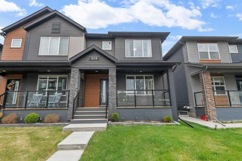 Photo of 315 Wolf Creek Way SE, Calgary, AB T2X 4Y8 (MLS # A2311450)