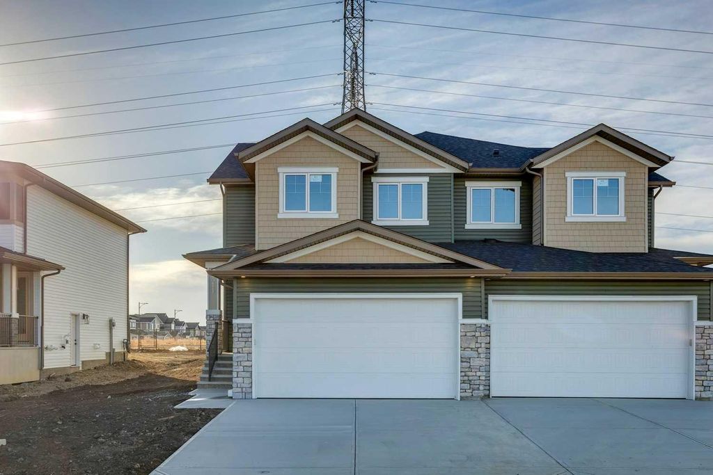 Photo of 311 Dawson Dock Way, Chestermere, AB T1X 2X2 (MLS # A2315707)