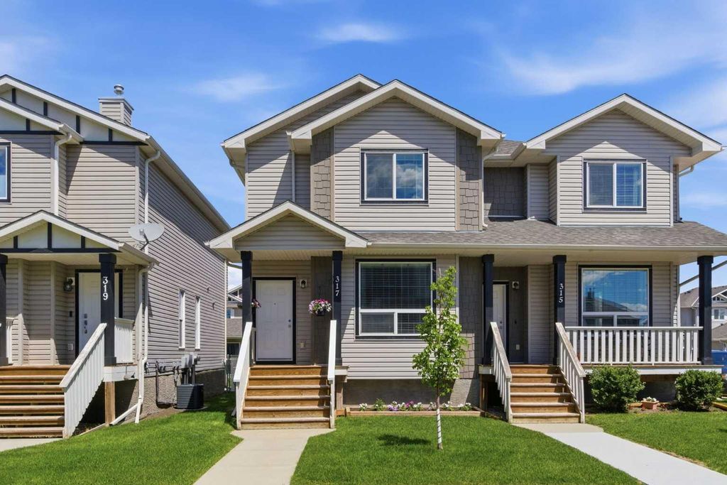 Photo of 317 Sandford Place NW, Langdon, AB T0J 1X2 (MLS # A2328122)