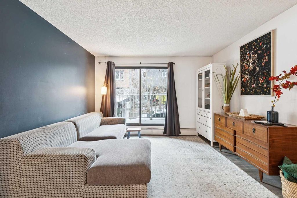 Photo of 835 19 Avenue SW #106, Calgary, AB T2T 0H6 (MLS # A2283035)