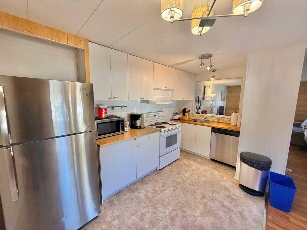 Photo of 726 Carmichael Lane #10, Hinton, AB T7V 1T1 (MLS # A2347196)