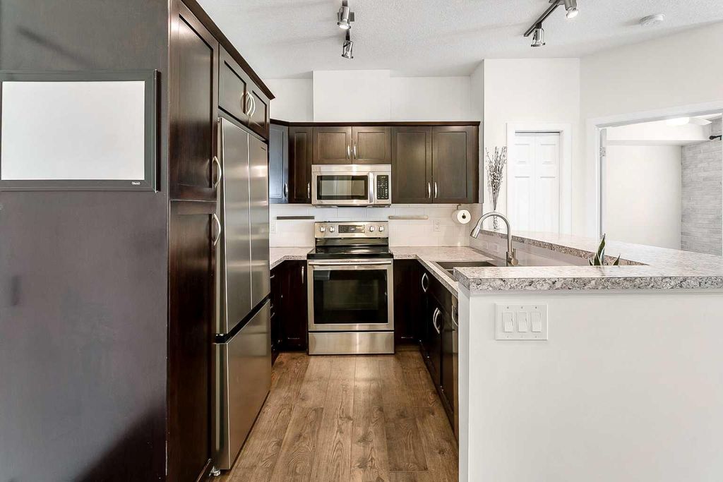 Photo of 1414 17 Street SE #102, Calgary, AB T2G 5S6 (MLS # A2283541)