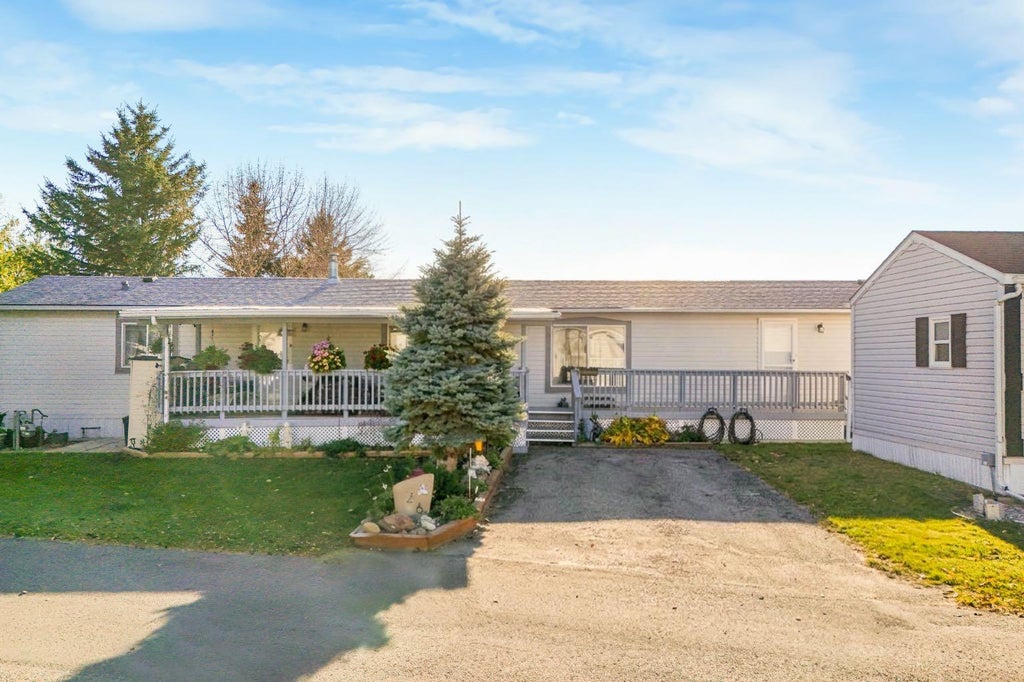 Photo of 26 Doubletree Way, Strathmore, AB T1P 1M8 (MLS # A2352862)