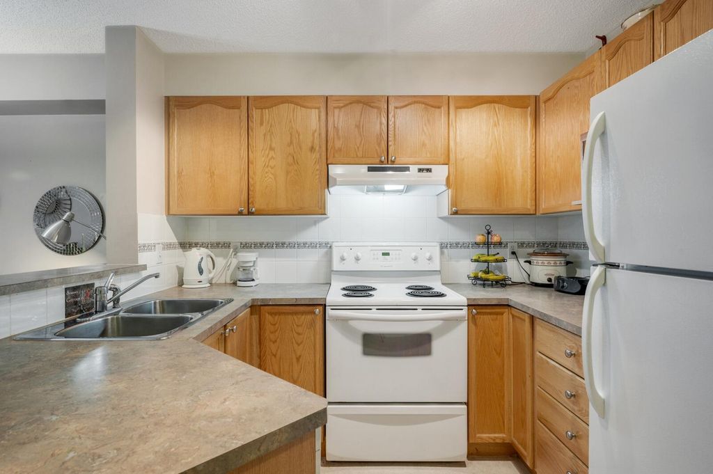 Photo of 950 Arbour Lake Road NW #2218, Calgary, AB T3G 5B3 (MLS # A2300603)