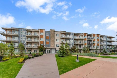 Photo of 370 Harvest Hills Common NE #108, Calgary, AB T3K 2M8 (MLS # A2280391)