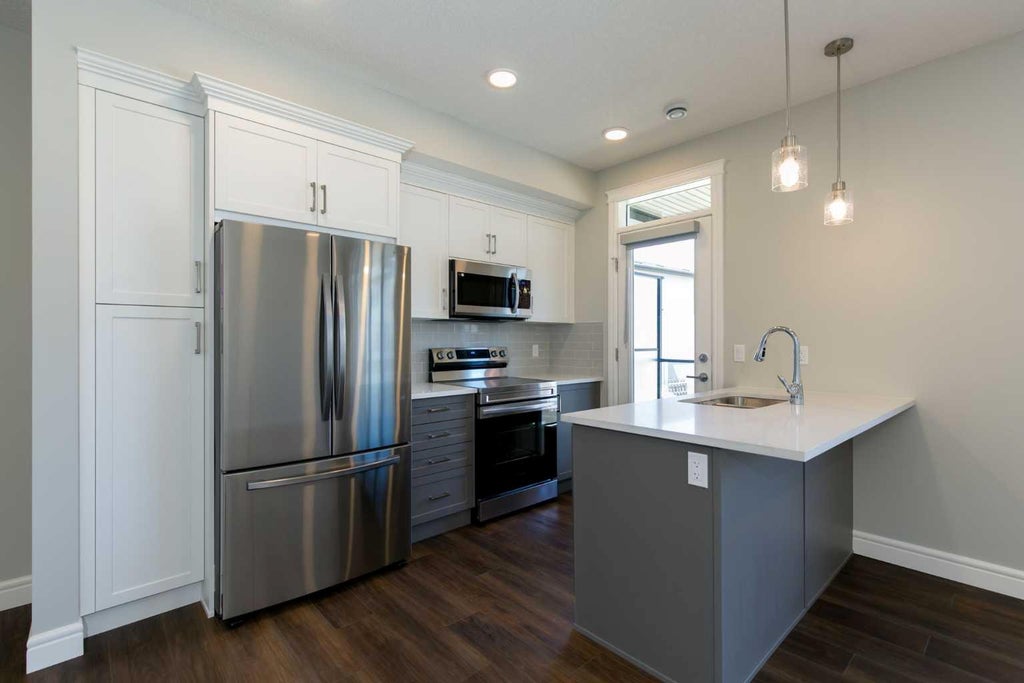 Photo of 414 Seton Passage SE #207, Calgary, AB T3M 3A7 (MLS # A2318663)