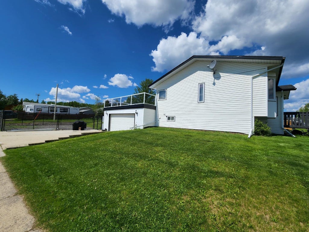 Photo of 11530 Manning Crescent Cres, Grande Cache, AB T0E 0Y0 (MLS # A2332049)