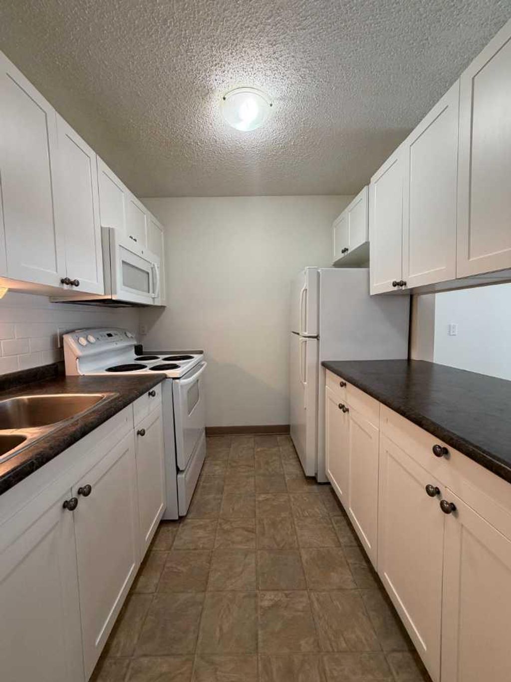 Photo of 14921 Macdonald Drive #223, Fort McMurray, AB T9H 4H3 (MLS # A2295405)